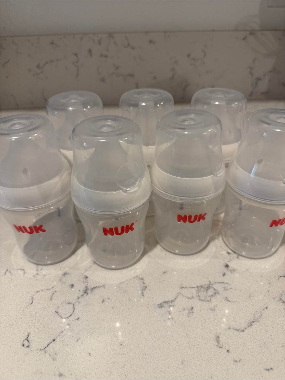 NUK Clear 5 oz Baby Bottles with White Caps - 7 Pack
